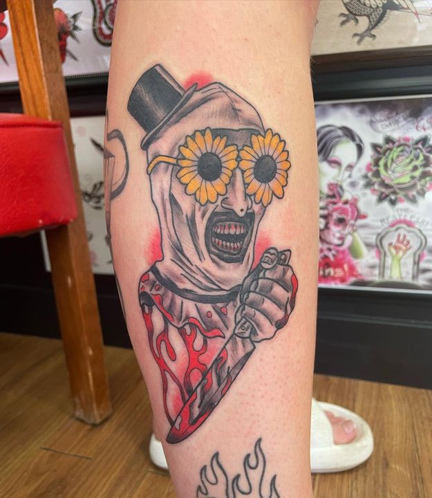 Colour horror clown forearm tattoo at Stingray Tattoo, Regina